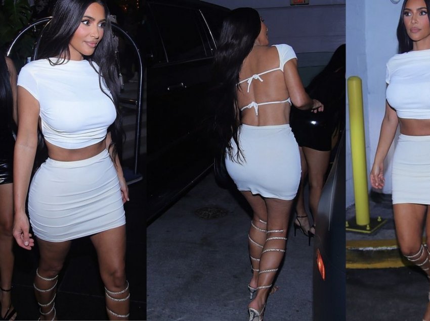 Kim Kardashian vë në dukje figurën e saj trupore me fustan të bardhë derisa feston me miqtë në Miami