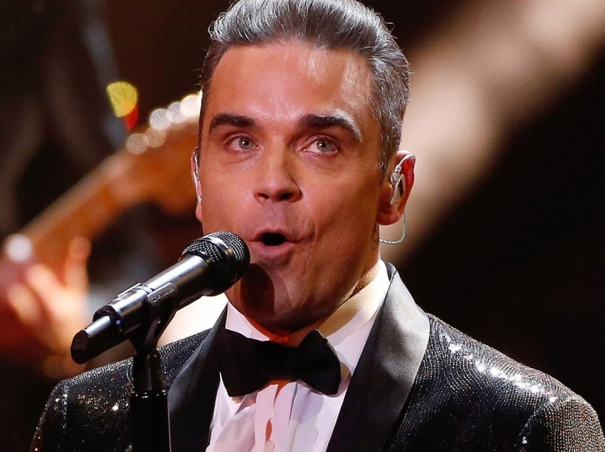 Robbie Williams dyshohet se po karantinohet në Karaibe për shkak të COVID-19