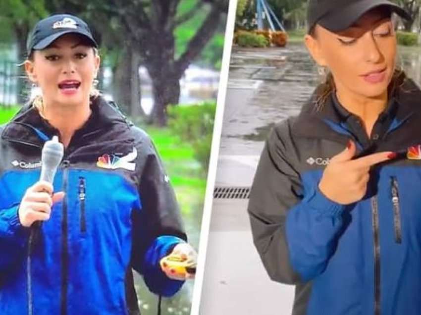 Erë e fortë dhe shi, gazetarja mbështjell mikrofonin me prezervativ